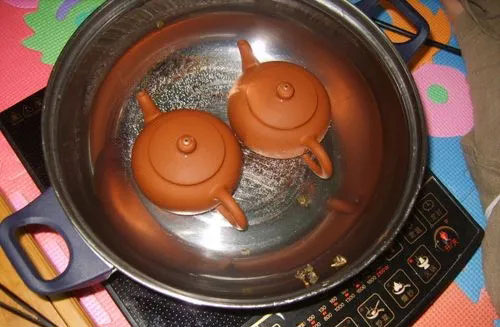 紫砂壶开壶先水煮还是先茶叶煮